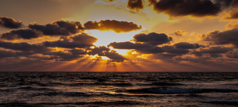 The extraordinary  beauty of the panoramic sunset over the Mediterranean Sea from the city of Ako in northern Israel
