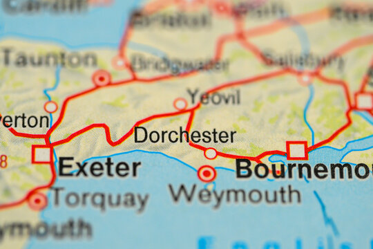 Close up road map showing Dorchester Exeter Weymouth and Bournemouth travel route.