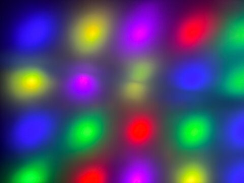 Abstract blurred background of colorful led light spots