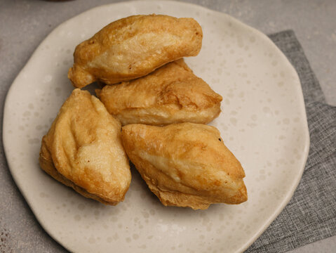 Batagor is bakso tahu goreng or fried tofu meatballs served with peanut sauce, popular fried snack in Indonesia