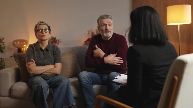 Man in his 50s complaining about his wife to psychologist, couple's therapy