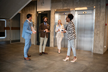 Fototapeta premium Diverse business professionals networking during a coffee break