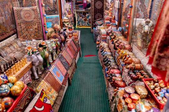 Kathmandu, Nepal - 04 April 2025: View of a traditional handicraft shop in Thamel filled with colorful elephant figurines, intricate textiles, and decorative ornaments.