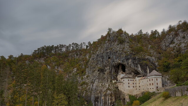 Predjama Castle (Predjamski grad), Renaissance fort built for defense under a natural rock arch high in the mountain stone wall. Postojna-Slovenia-198
