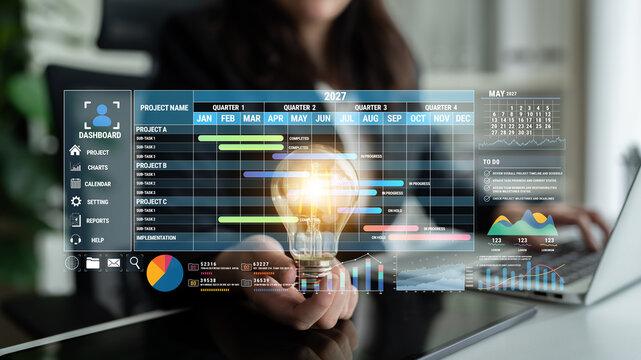 Business professional analyzing project management dashboard with timeline and performance indicators while holding light bulb in hand symbolizing ideas and innovation Fluxor.
