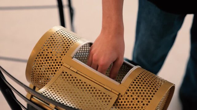 Hand going in to a raffle drum