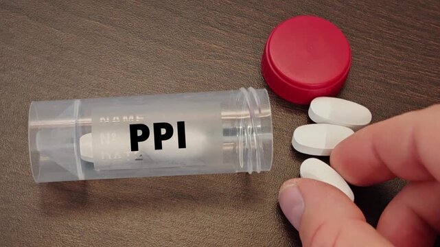 PPI proton pump inhibitor class for acid reflux heartburn and peptic ulcers tablet taken by a patient