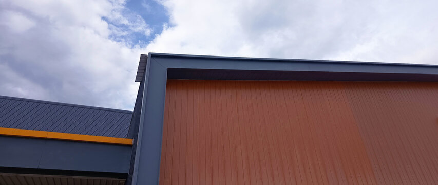 Large steel structure truss. roof frame and metal sheet in building construction site, Modern construction, Metal iron ribbed arch roof, Large building roof. not ai