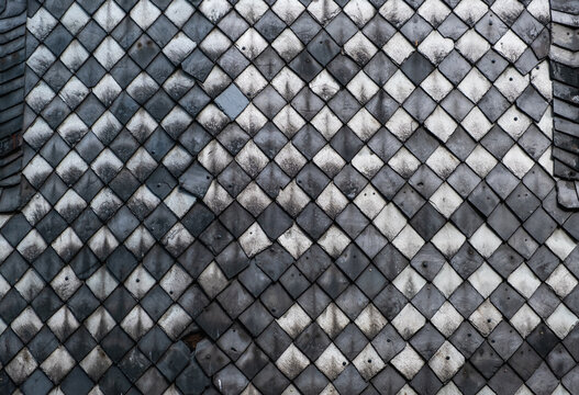 Furth, Bavaria, Germany - 15 July 2026: View of the weathered diamond-shaped slate tiles on a historic building in the old town.
