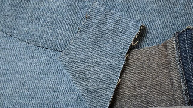 Blue denim jeans fabric texture rotating
