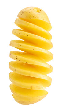 A peeled and sliced yellow potato is artfully stacked in thin cross-sections, showcasing its vibrant color and texture