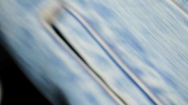 Macro dolly shot of denim jeans fabric texture