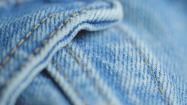 Blue denim jeans fabric texture close up