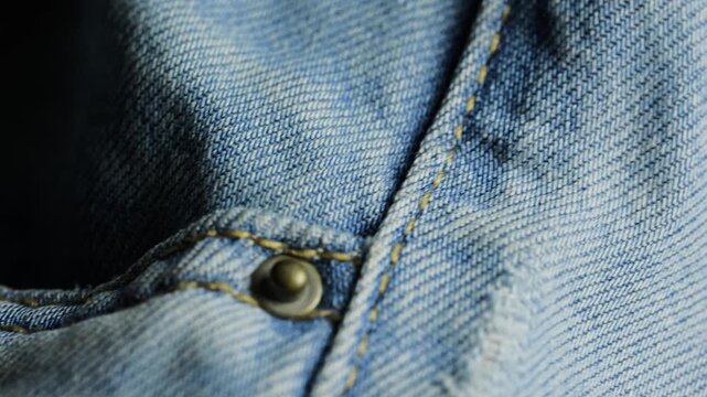 Blue denim jeans fabric texture macro view