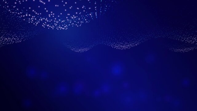 A dynamic field of small glowing blue particles forms undulating wave-like patterns