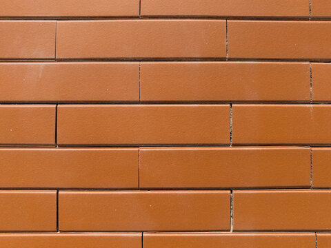 Terracotta brown ceramic wall tile texture background