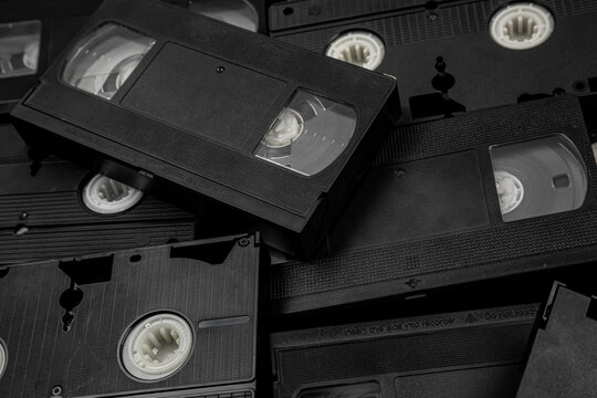 Pile of old VHS video cassette tapes