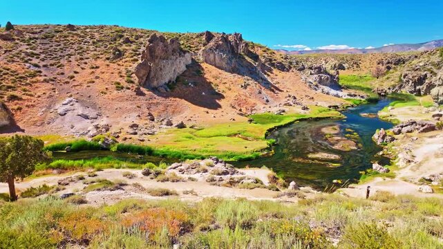 Hot Creek winds through a rocky canyon at the scenic Hot Creek Geologic Site