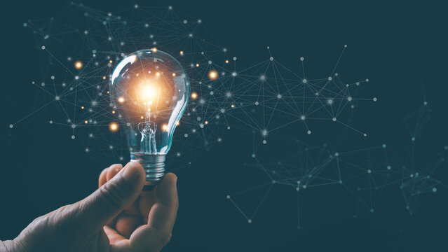 Innovation and creative technology concept. Glowing light bulb connected to digital network. Ai, inspiration, brainstorming, smart solutions, knowledge sharing and future digital transformation.