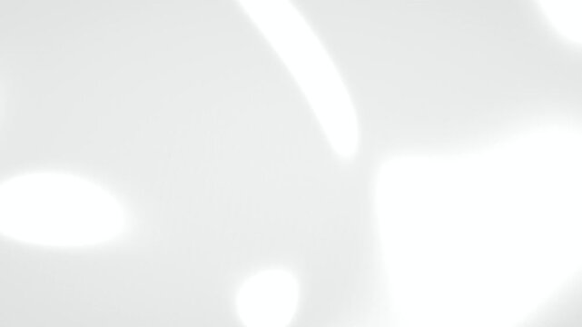 Soft elongated light shapes shift dynamically across a light grey background