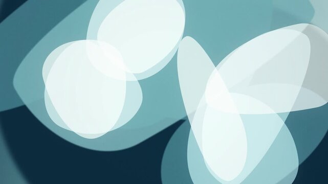 Translucent teal and blue organic shapes overlap in a slow fluid motion
