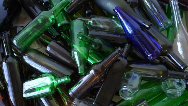 Glass Bottles Collected and Sorted at a Recycling Facility for Sustainable Waste Management