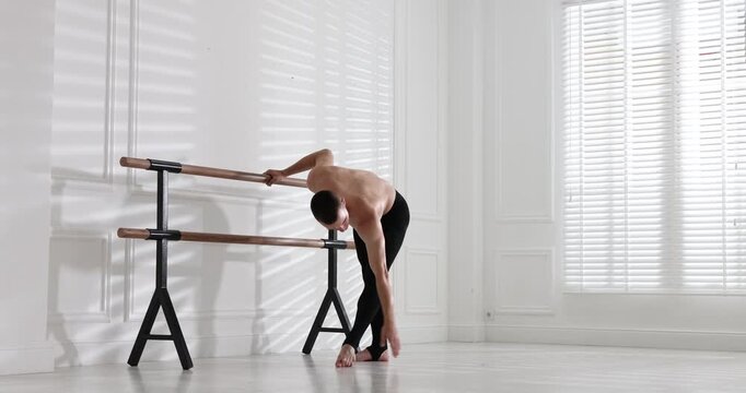 Professional dancer practicing moves in dance studio