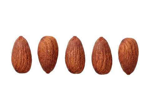 Five whole almonds with textured brown skin and salt grains isolated on black background for health food packaging and snack promotion