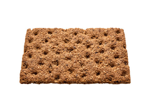 Whole Grain Rye Crispbread Cracker with Crunchy Seed Texture Isolated on Black Background for Healthy Nutrition and Diet Food Marketing