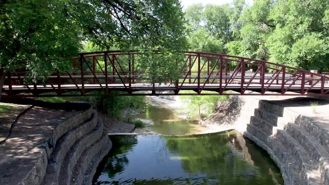 Aerial video of a bridge on the Cottonwood Creek Trail in Allen, Texas