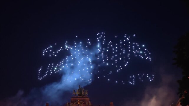 Drone Swarm Spelling Diables Rouges in Night Sky above Cinquantenaire during Belgian National Day, Static Shot