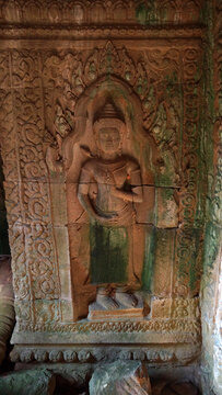 Detailed historical Devata or Apsara bas-relief sculpture inside Preah Khan sanctuary, Angkor