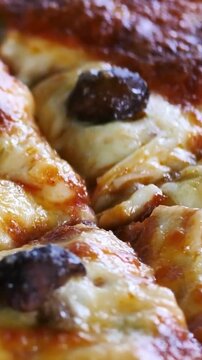 Fresh Pizza Being Sliced for Delivery