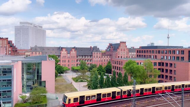 Historic Charit&eacute; campus with Berlin TV Tower and S-Bahn passing by
