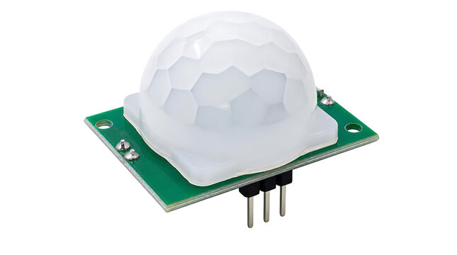 White PIR motion sensor module on green circuit board.
