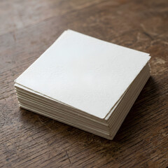 Fototapeta premium Stack of Blank White Paper Sheets on Wooden Surface for Writing or Printing.
