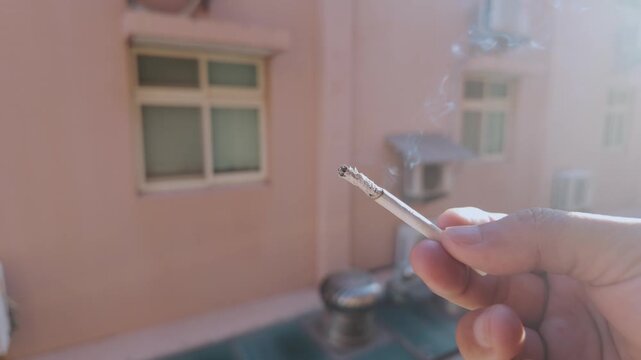 Cigarette Smoke in Morning Sunlight by Apartment Window Time Lapse