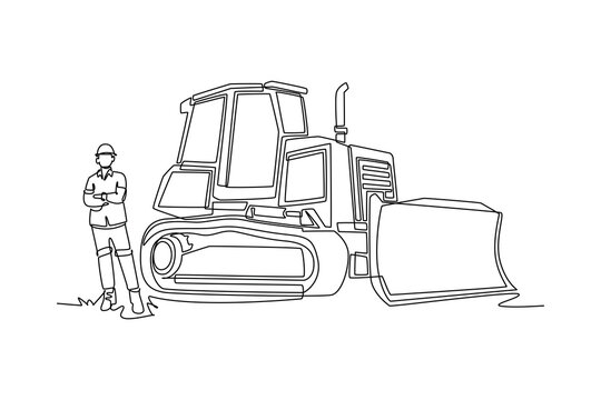 Single one line drawing young male construction worker wearing safety helmet standing with arms crossed next to heavy crawler bulldozer vehicle. Continuous line draw design graphic vector illustration