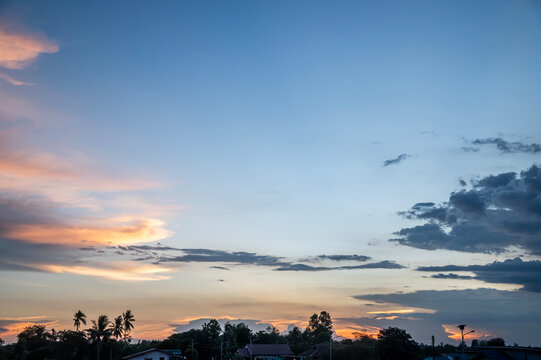 Beautiful Sunset Sky Over Village Silhouette.