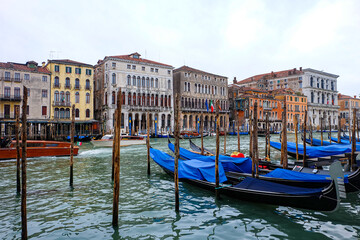 City of Venice, water taxi, gondola, canal street, bridge, boats and colorful local buildings and houses  © PaBou