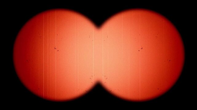 Vintage Super 8 film texture with light leaks, Super 8 Film Overlay with Vintage Noise Dirt and Nostalgic Light Leaks in Binocular Frame Background 4k video animation seamless loop
