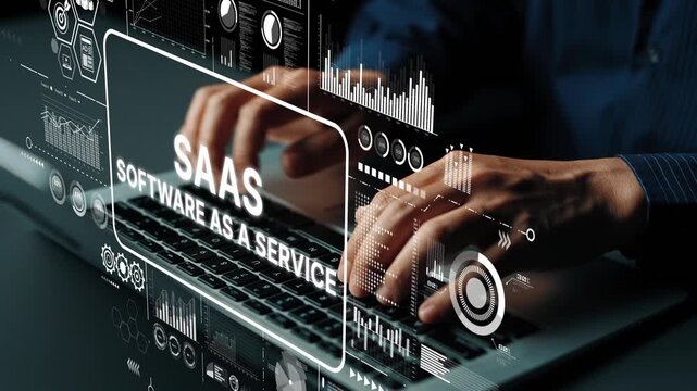 Hands Typing on Keyboard with SaaS Concept Overlays Displaying Software as a Service Graphics and Data Visualizations. Asymptotic smart data analytic.