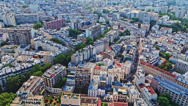 Paris is a dense capital defined by classic Haussmannian apartment blocks, zinc rooftops, tree-lined boulevards, and distinct residential neighborhoods. Notably many public parks as shown here.