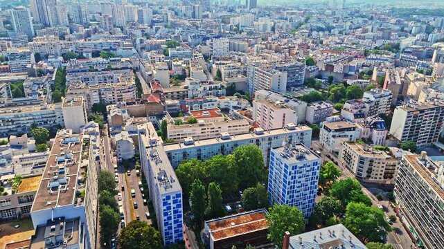 Paris is a dense capital defined by classic Haussmannian apartment blocks, zinc rooftops, tree-lined boulevards, and distinct residential neighborhoods. Notably many public parks as shown here.