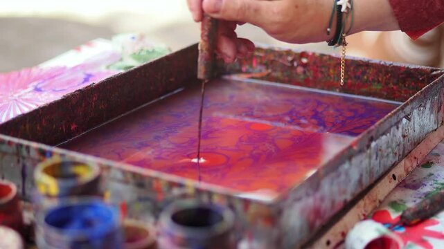 Artist Creating Traditional Ebru Water Marbling Art