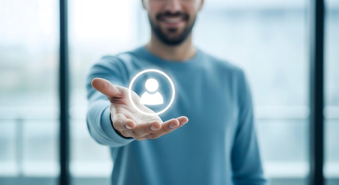 Businessman holding glowing virtual profile icon for customer service concept