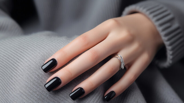 Glamour woman hand with black nail polish on her fingernails. Black nail manicure with gel polish at a luxury beauty salon. Nail art and design. Female hand model. French manicure. Generative AI.