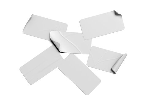 Blank white rectangle stickers mockup scattered on studio background