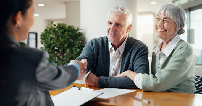 Smile, old couple and handshake at house with advisor, real estate deal and purchase agreement. Senior people, shaking hands or thank you for consultation, retirement benefits and finance negotiation