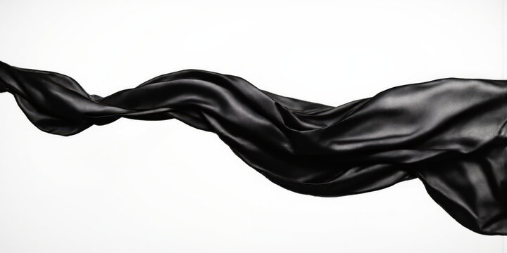 Monochrome Floating Fabric A weightless swath of black silk hovering in midair, set against a crisp white background. The camera's